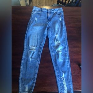 High rise skinny jeans, slightly ripped design